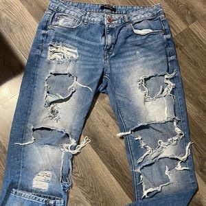 Refuge ripped blue jeans size 8 in women’s